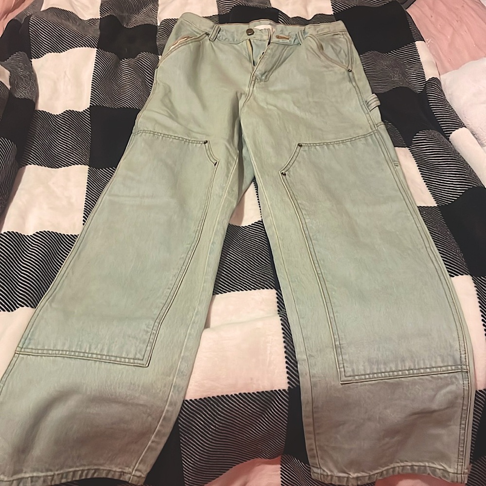 Brightish blue jeans with pockets